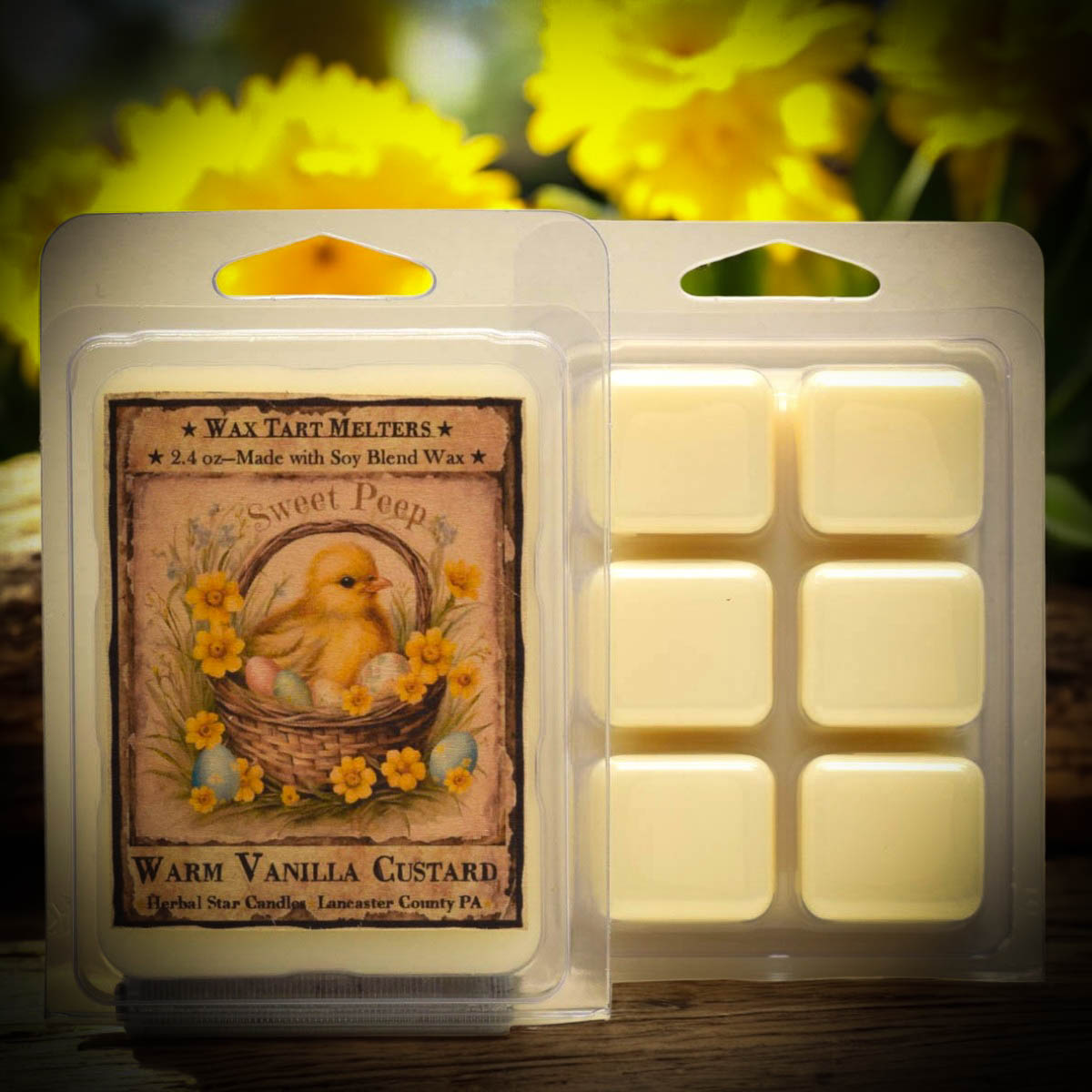 Wax tart melt package with 'Sweet Peep' design and vanilla custard scent, set against a blurred floral background.