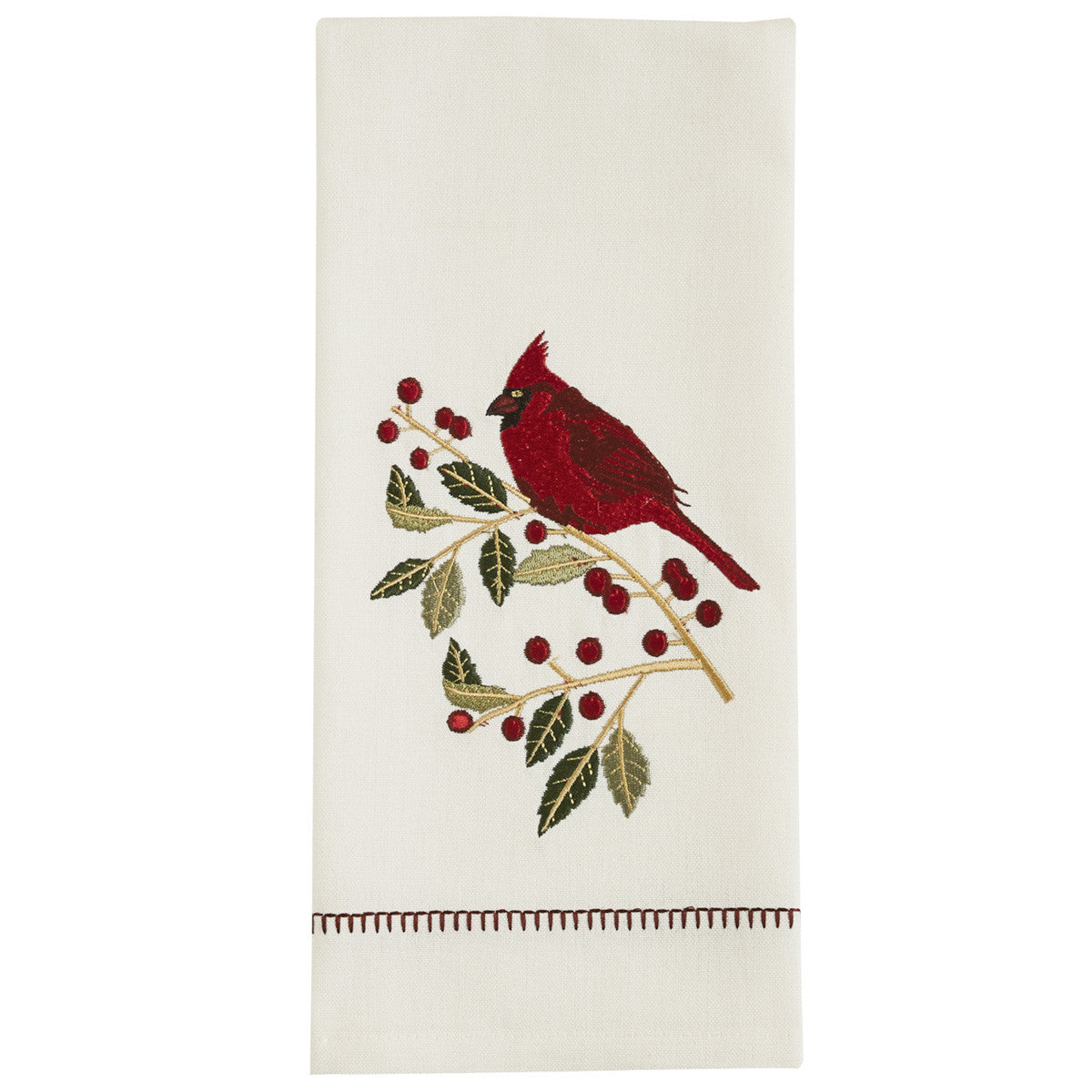 A white dishtowel with an embroidered design of a red bird, holly branches, and red berries along the bottom edge.