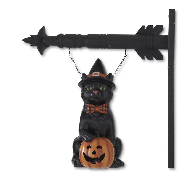 Halloween decoration with a black cat and pumpkin on a white background