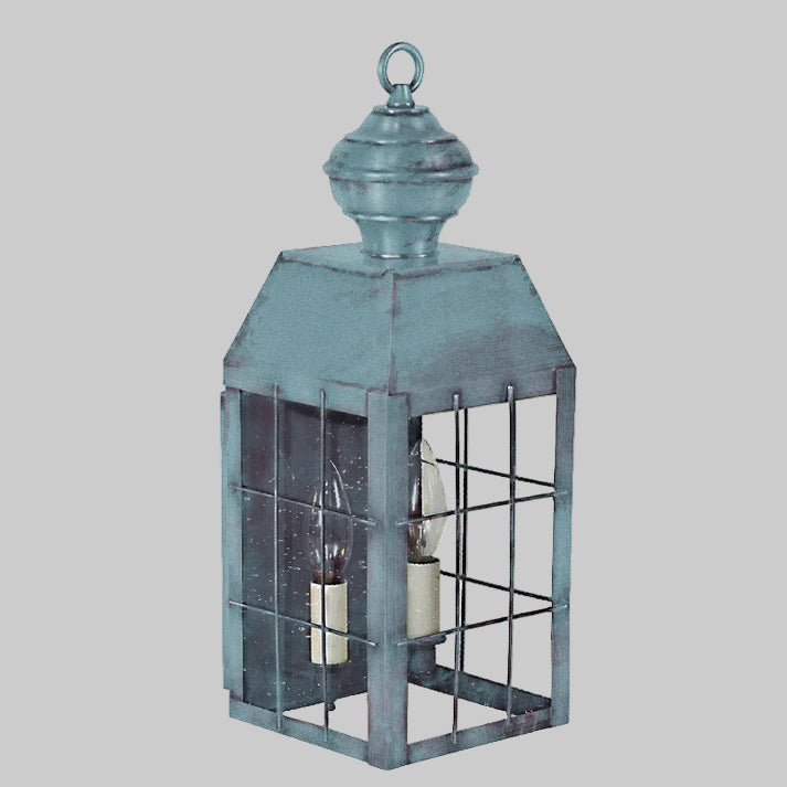 Decorative lantern with a blue metal finish on a white background