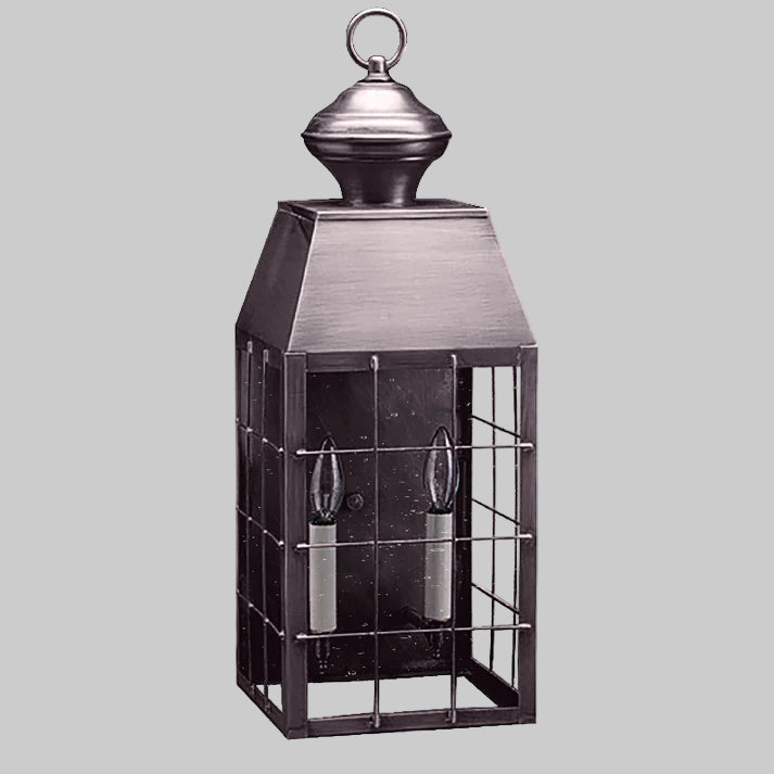 Decorative lantern with a metallic finish on a white background
