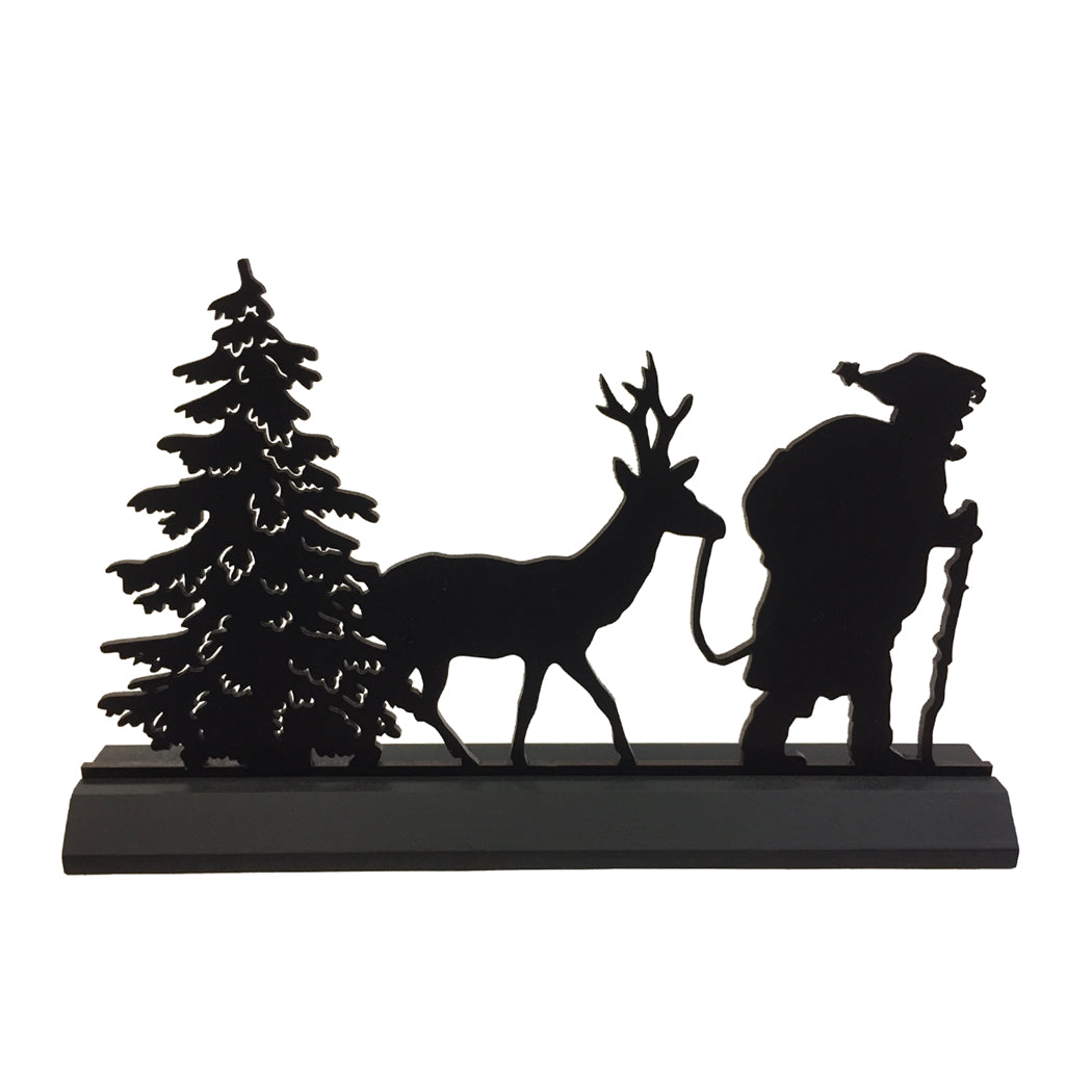 A flat black silhouette of Santa Claus with reindeer and a Christmas tree.