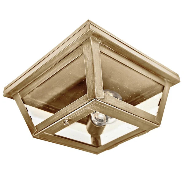 Gold ceiling light fixture on a white background