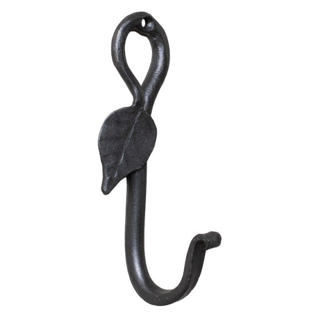 A wrought iron leaf-shaped wall hook with an antique finish, designed for hanging coats or decoration.