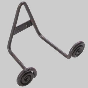 A black wrought iron plate stand with a curved design.