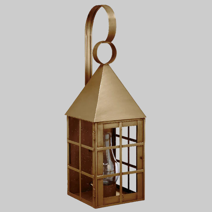Decorative brass lantern on a gray background