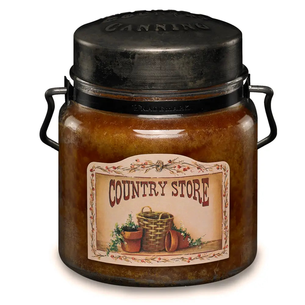 Jar candle with lid and handle with the label "Country Store"