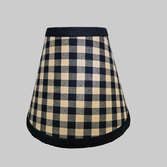 Plaid skirt with black trim on a gray background