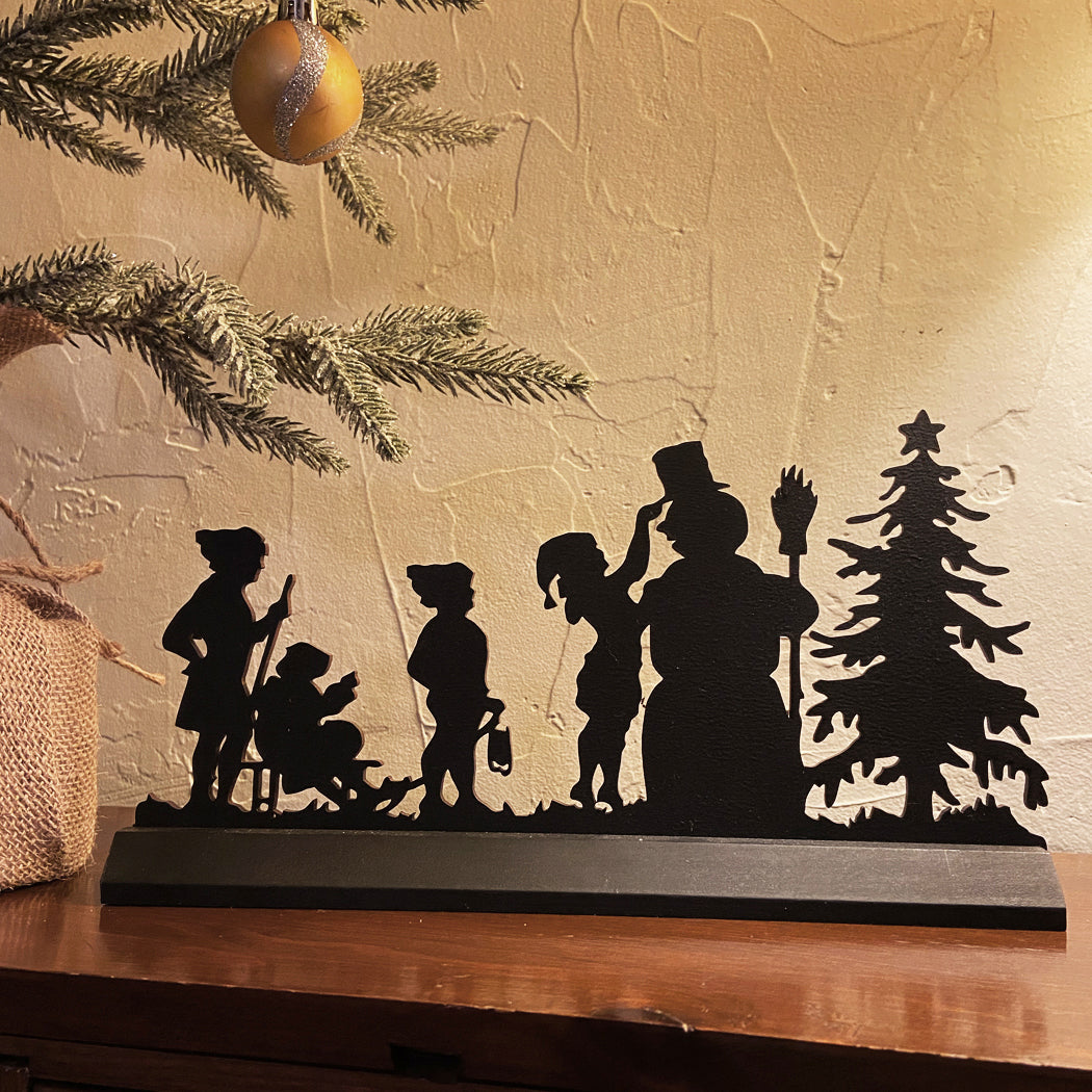 Decorating Frosty the Snowman black silhouette