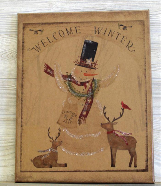 Canvas print with the words "Welcome Winter" over an illustration of a snowman and two reindeer