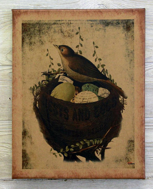 A canvas print featuring a bird perched on a nest with eggs, surrounded by a beige and brown textured background.