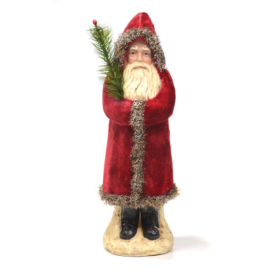 12 inch deep red velvet belsnickel holding branch on white background.