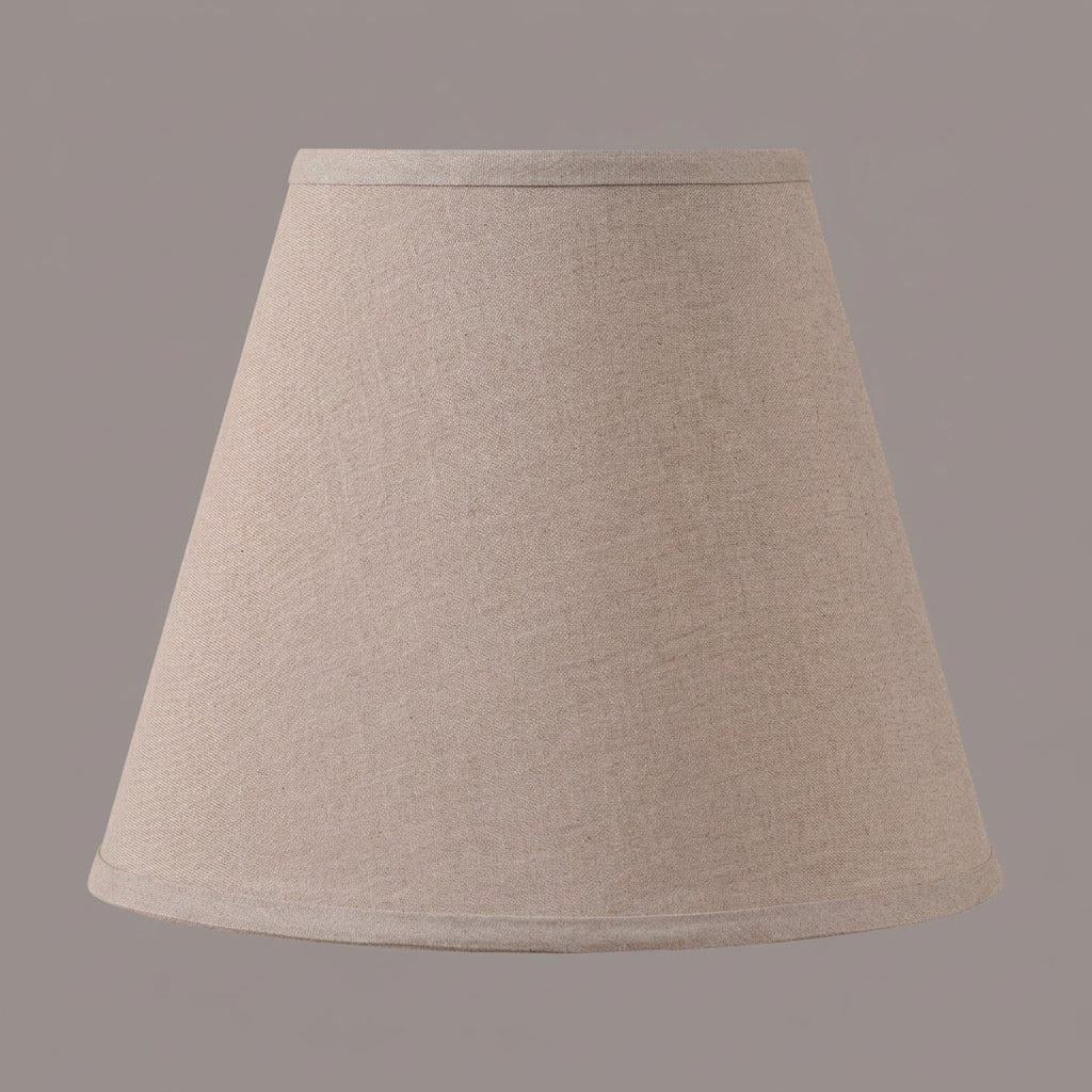 A classic tapered fabric lampshade in a warm beige or light tan linen-like material, shown against a plain white background.