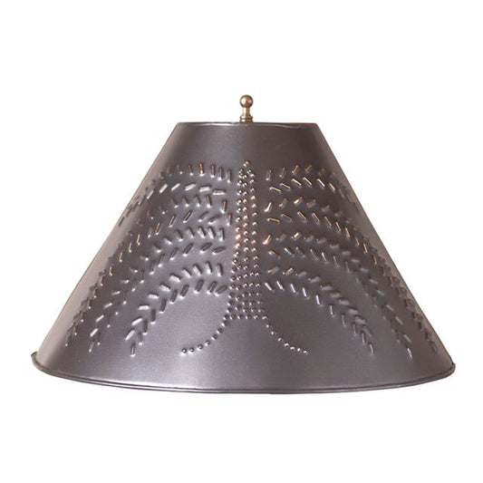A metal lamp shade with a smokey black finish, featuring a punched tin design resembling a willow tree.