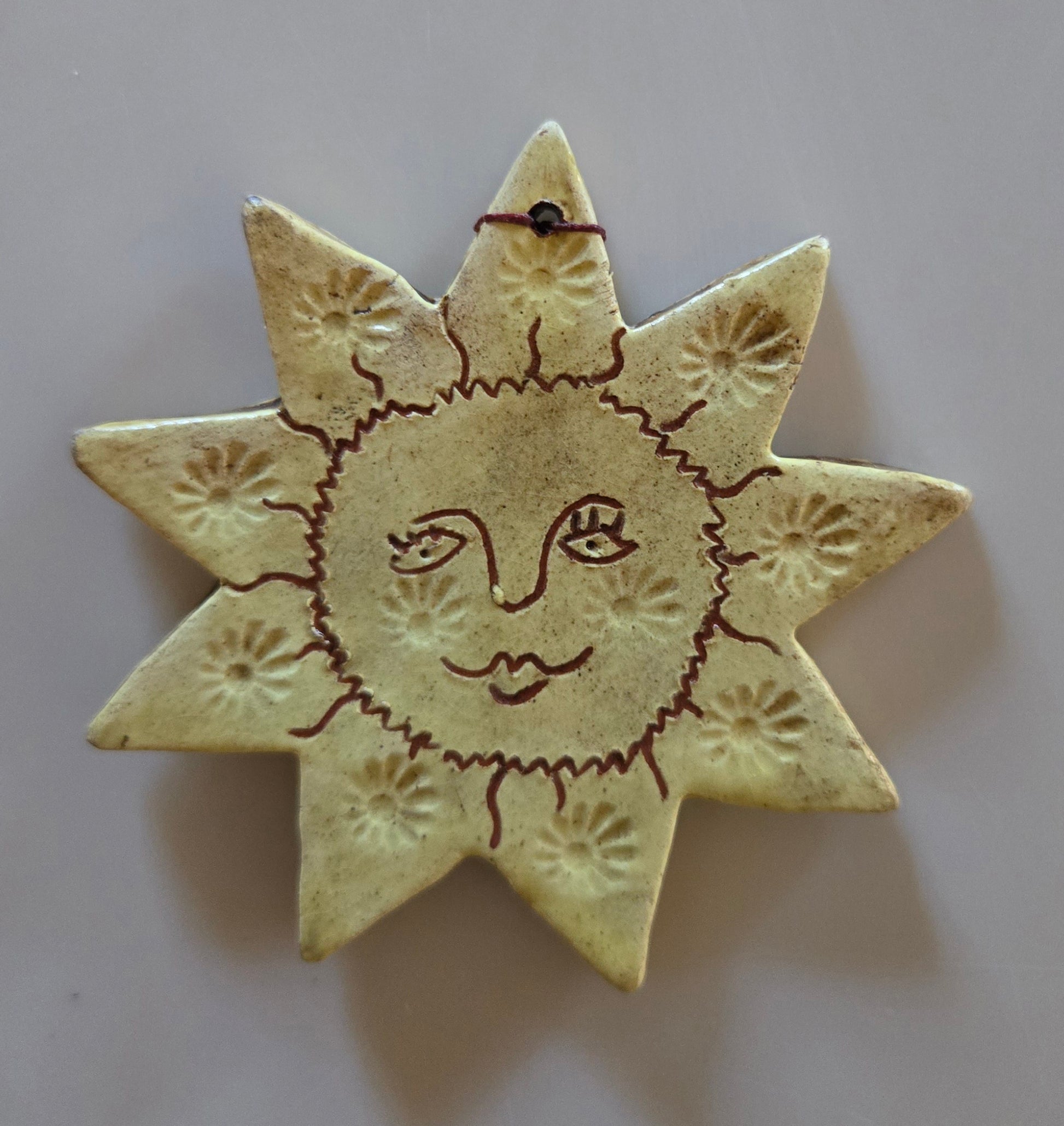 Sun Redware Ornament