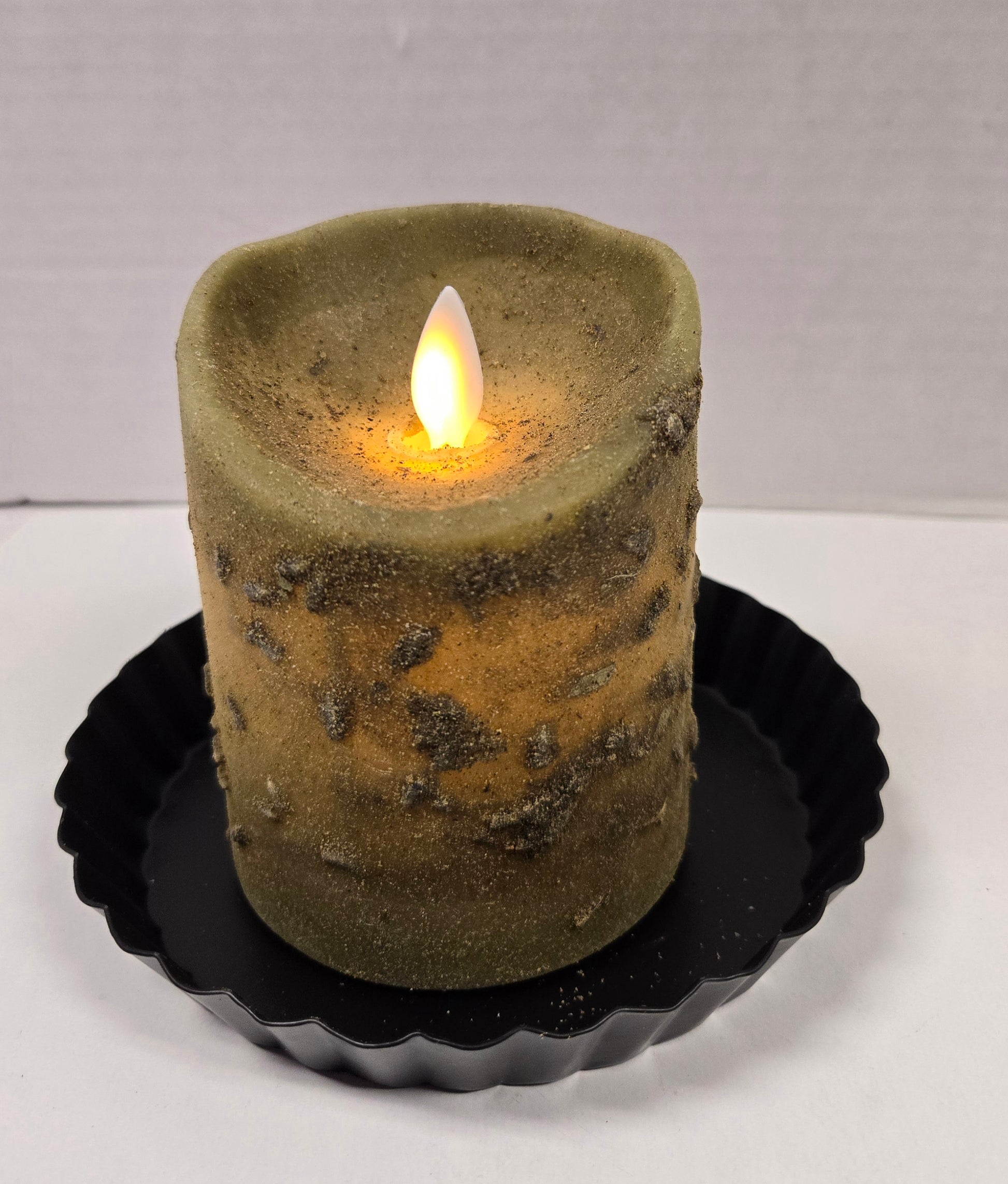 3" x 4" moving flame herb pillar candle with timer feature