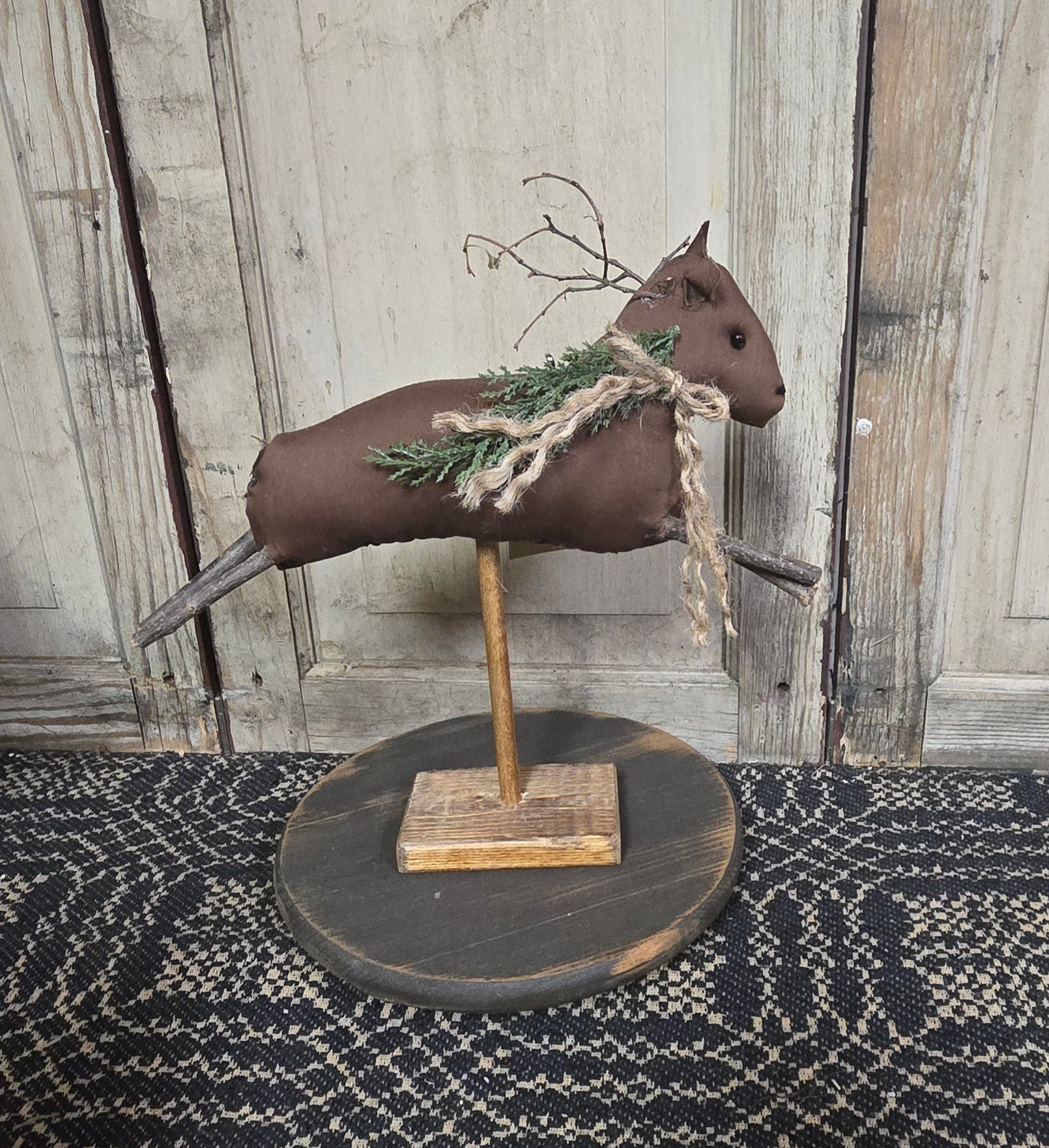 Primitive Reindeer on Wooden Base