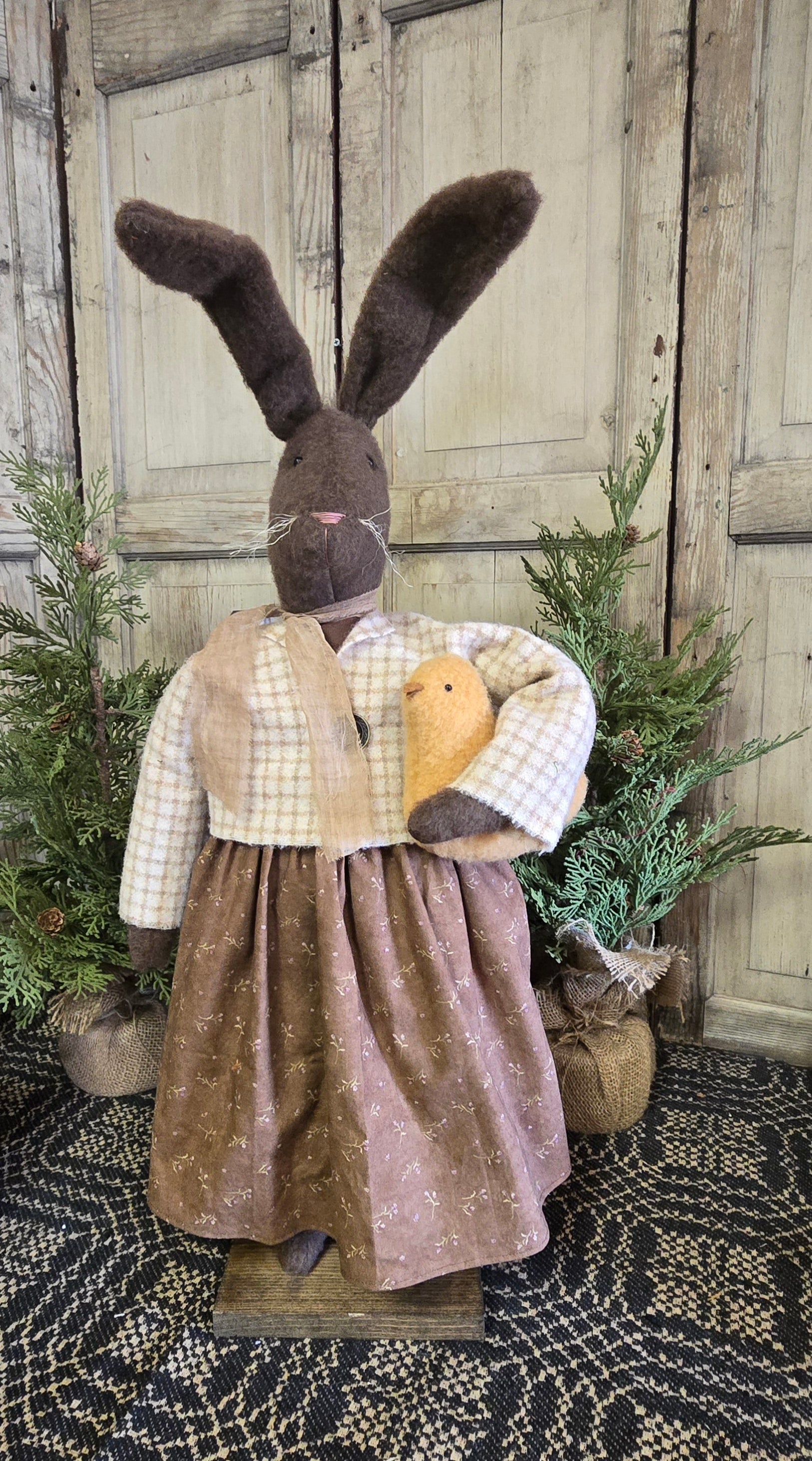 Primitive Bunny Holding Chick