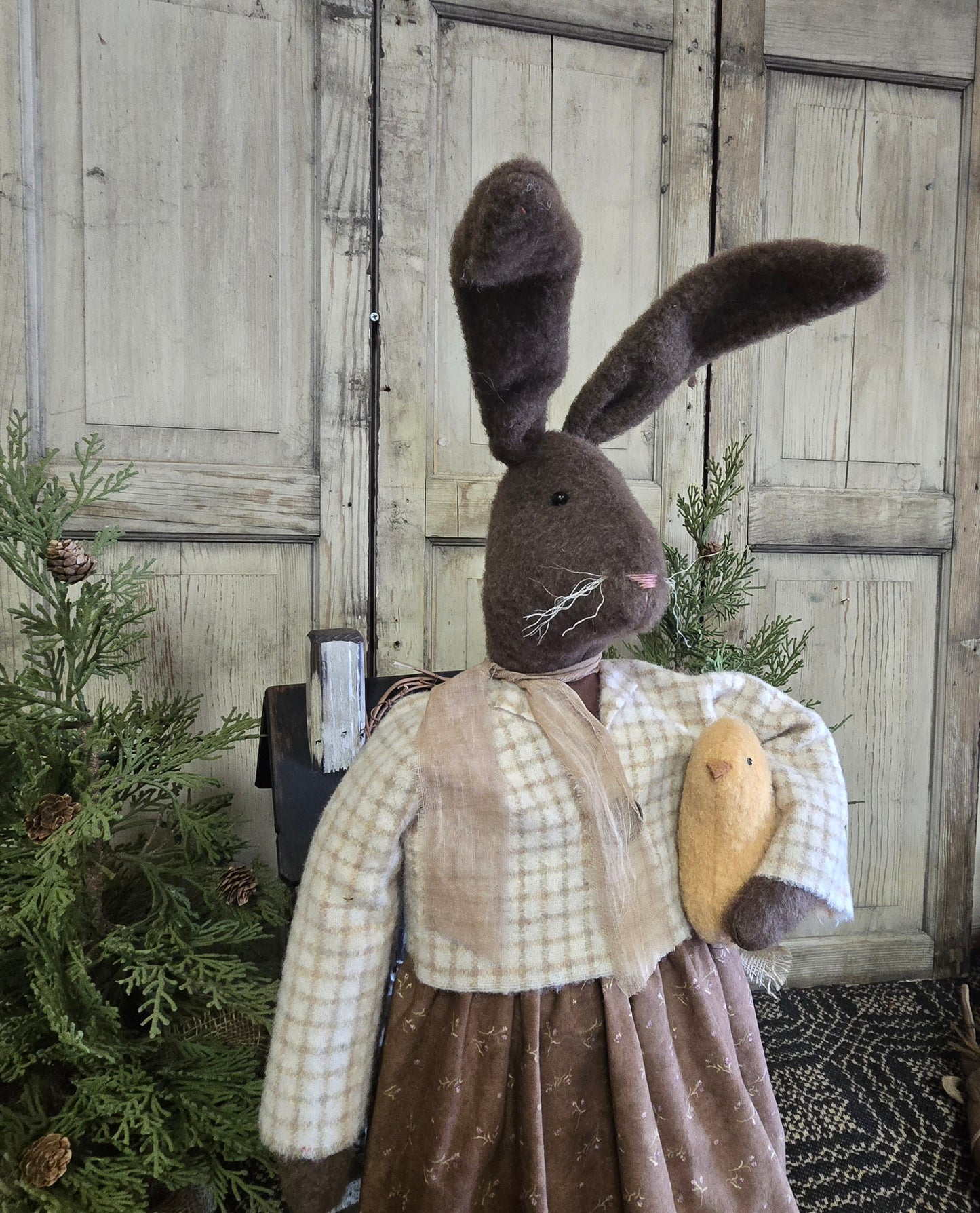Primitive Bunny Holding Chick