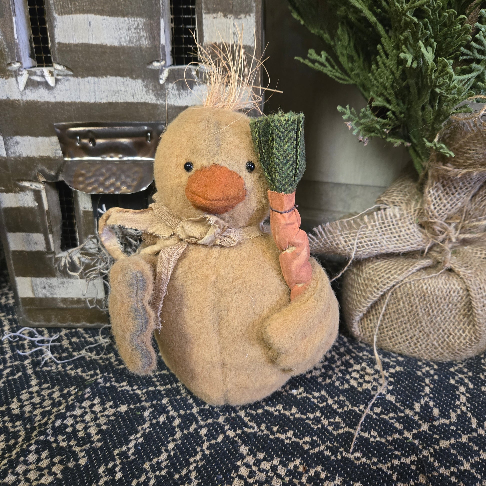 Primitive Chick Holding Carrot