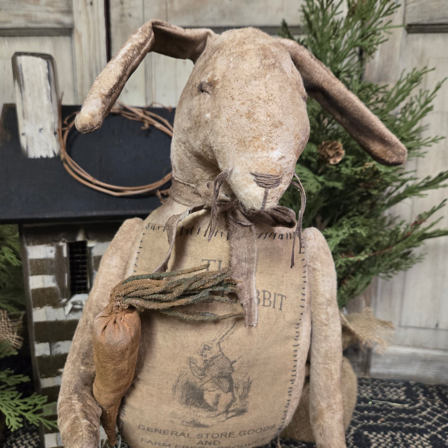 Primitive Bunny Holding Carrot