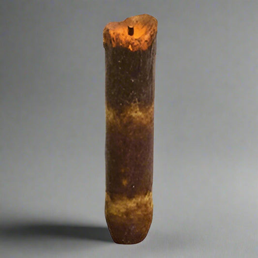 Burnt ivory timer taper on gray background