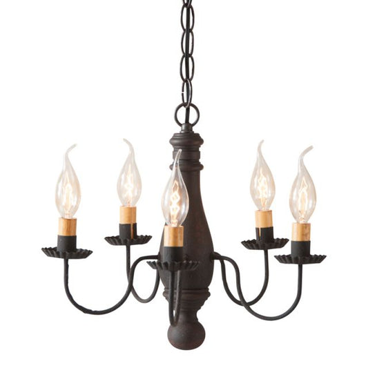 A compact chandelier with a black finish, featuring textured arms and crimped pans, with five E12/Candelabra sockets.