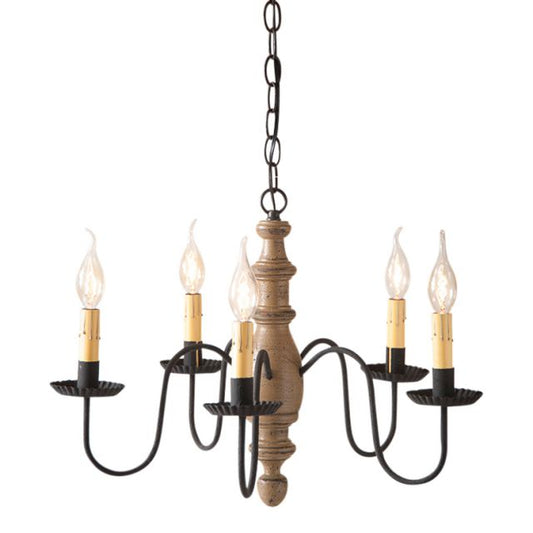 A midsized chandelier with a handspun body in pearwood color, featuring black textured arms and crimped pans, with five E12/Candelabra sockets.