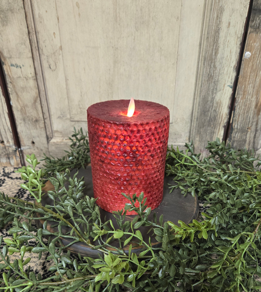 5 inch beeswax honeycomb moving flame pillar in red with greenery.