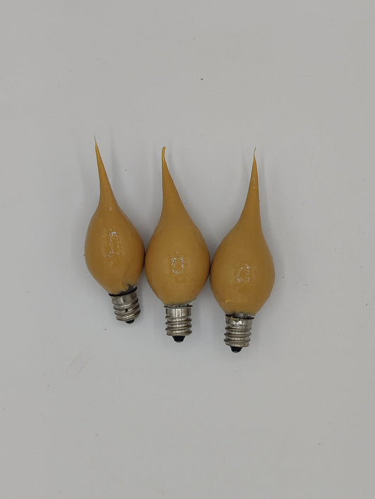 Three yellow scented silicone bulbs with metal bases, displayed against a white background.