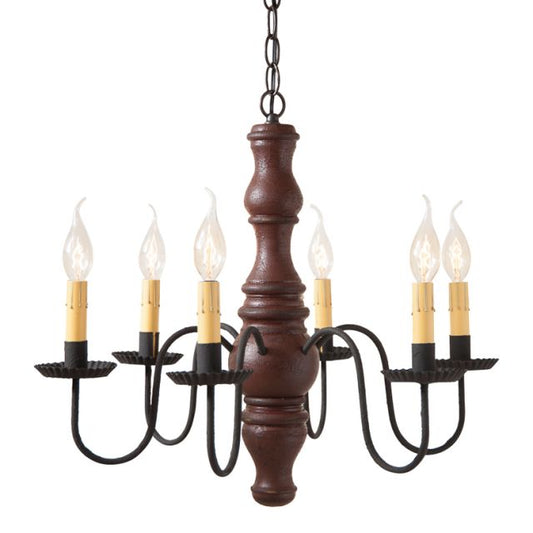 A Gettysburg wooden chandelier with a textured Plantation Red finish, black arms, and crimped pans. It features six E12/Candelabra sockets and is hung from a chain.