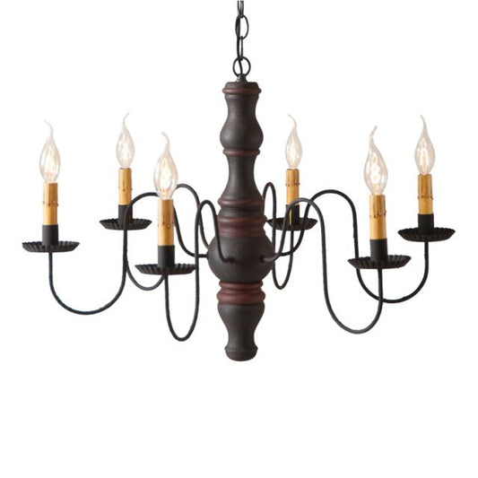 Six arm primitive chandelier with six candelabra sockets in a black with red stripe paint finish on white background.