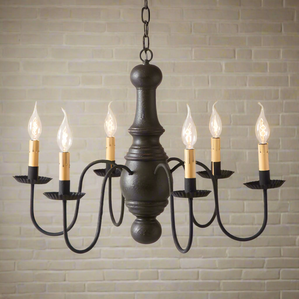 A black, textured chandelier featuring a ceiling plate and six E12/Candelabra sockets.