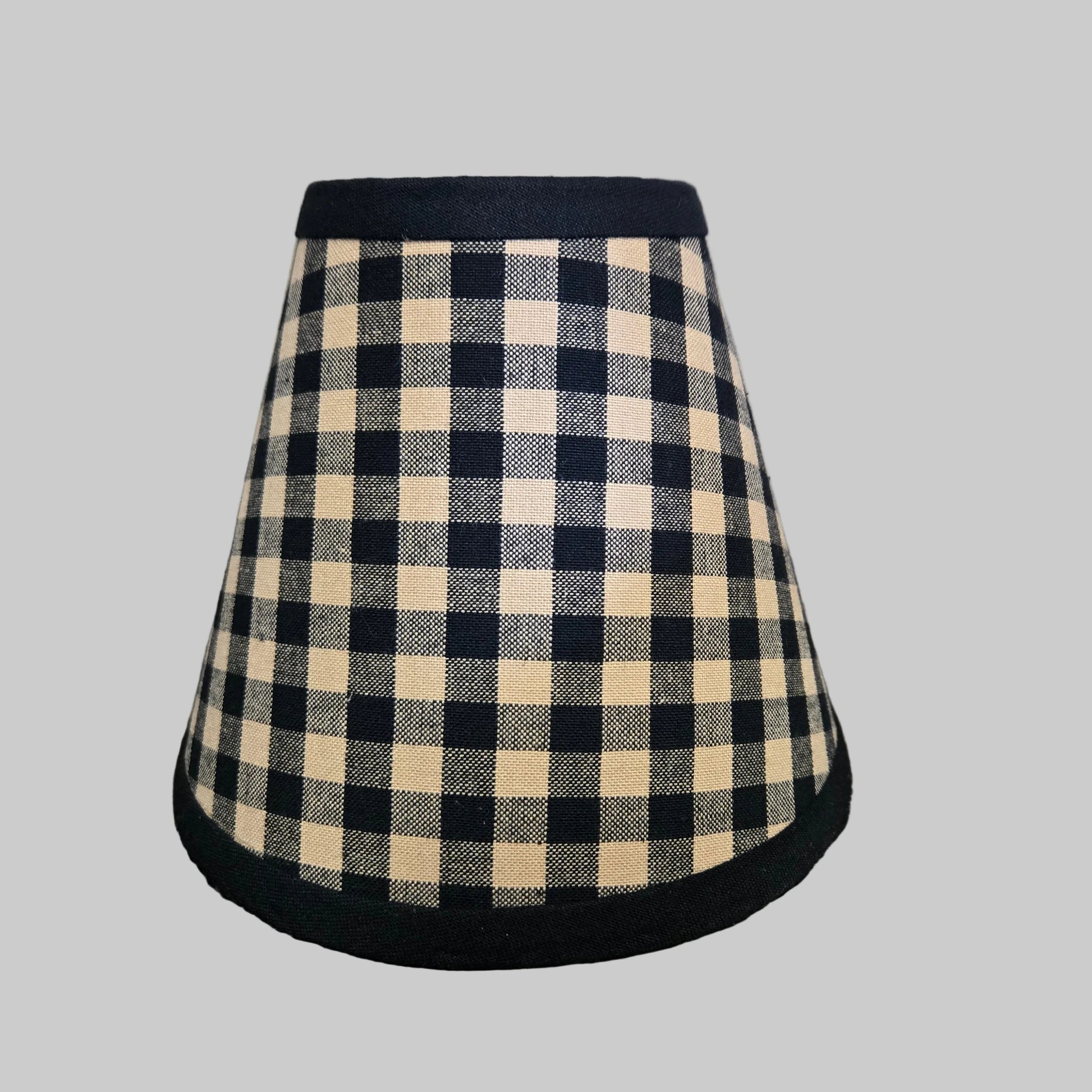 Black and white checkered fabric on a wooden surface