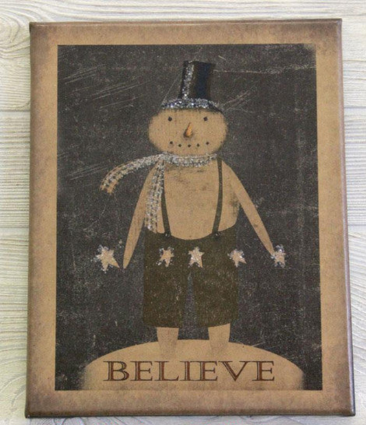Canvas print with a snowman with a top hat and scar holding a string of stars with the word "Believe" underneath him