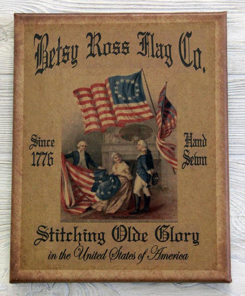 Canvas print advertising the Betsy Ross Flag Co. with an illustration of her stitching the flag with some founding fathers standing next to her