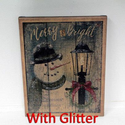 Canvas print with a snowman next to a post light with the words "Merry & Bright" above him