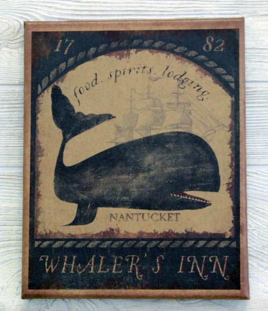 A canvas print featuring a whale illustration, labeled 'Whaler's Inn' and 'Nantucket', with a vintage-style design, predominantly in shades of black, beige, and white.