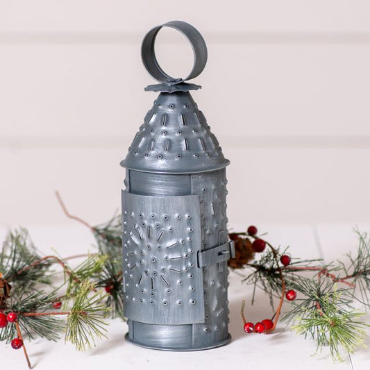 Punched tin paul revere light with greenery