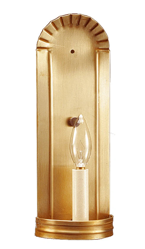 A gold-colored wall-mounted sconce with a candelabra base bulb.