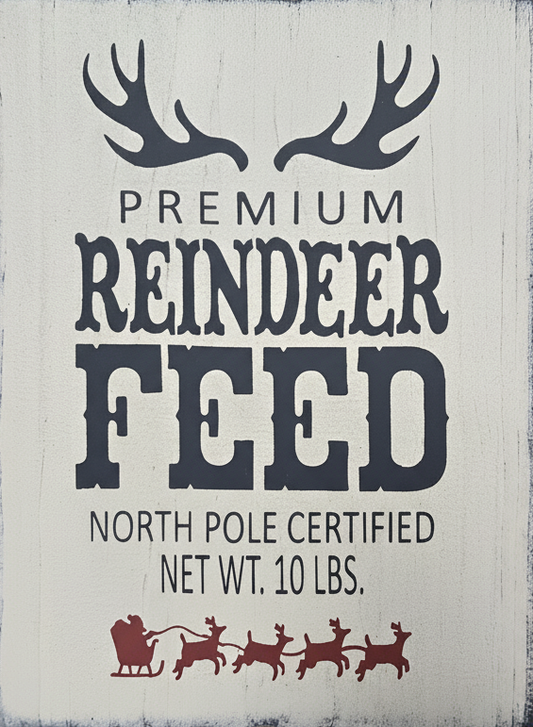 Wooden sign with text 'Premium Reindeer Feed' and a reindeer illustration on a light background