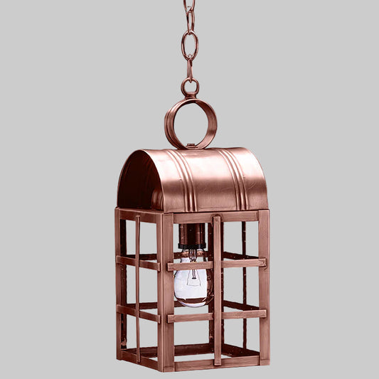 Copper pendant light fixture on a gray background