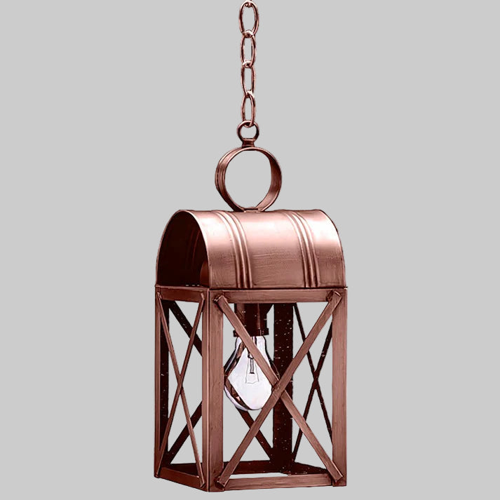 Copper hanging lantern with a light bulb inside on a gray background