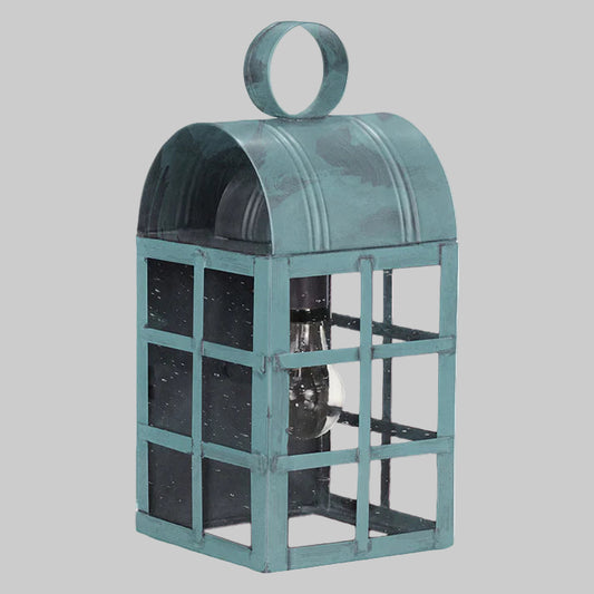 Teal metal lantern with grid design on a white background