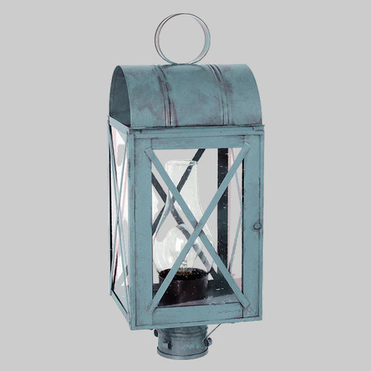 Vintage-style outdoor lantern with a metallic finish on a gray background