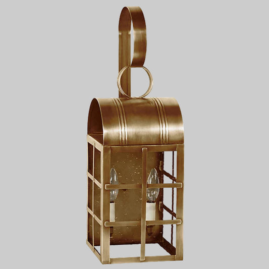 Bronze lantern with a handle on a gray background