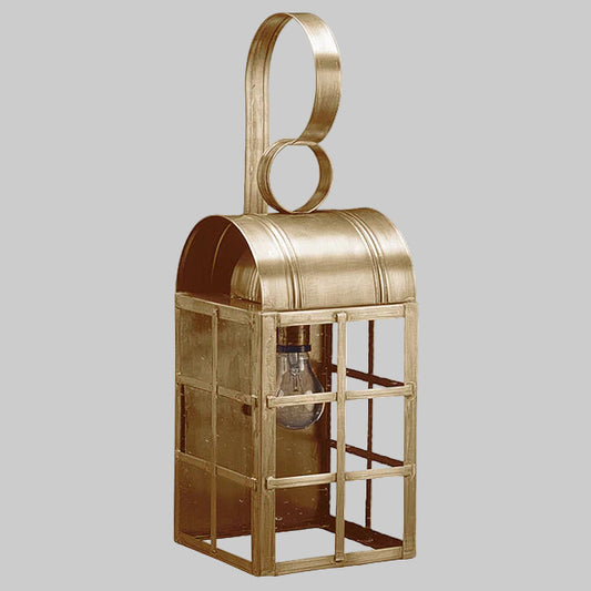 Decorative metal lantern with a handle on a gray background
