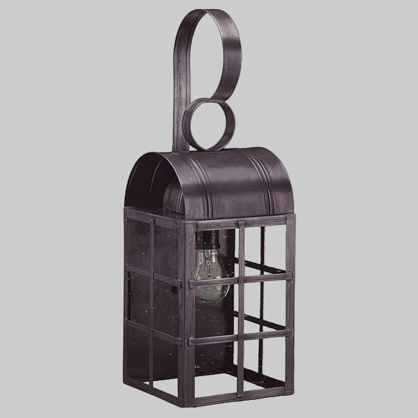 Decorative metal lantern with a handle on a gray background
