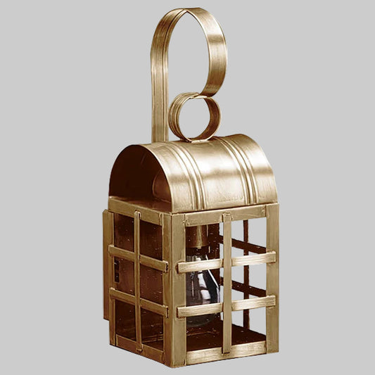 Bronze lantern with a handle on a gray background