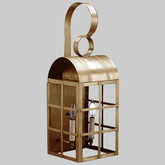 Gold lantern with circular design on a gray background